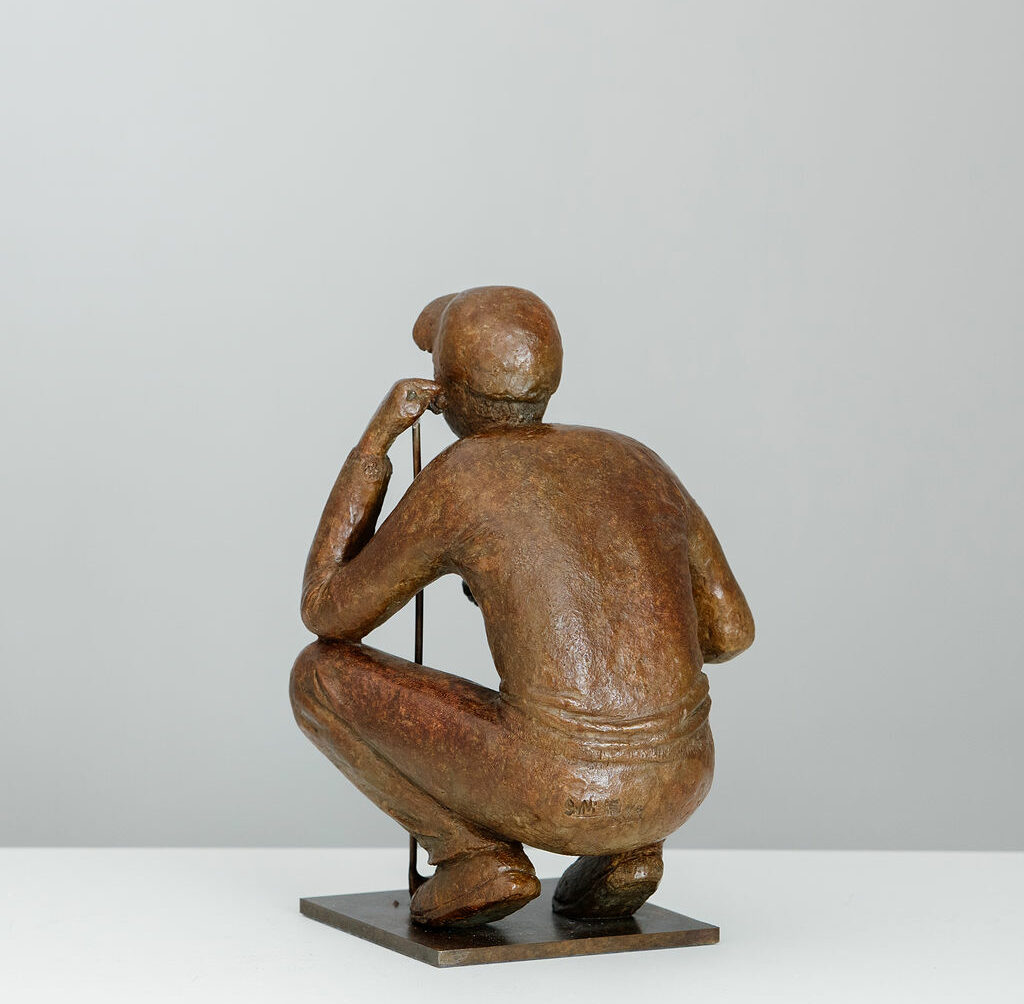 le golfeur sculpture bronze dos